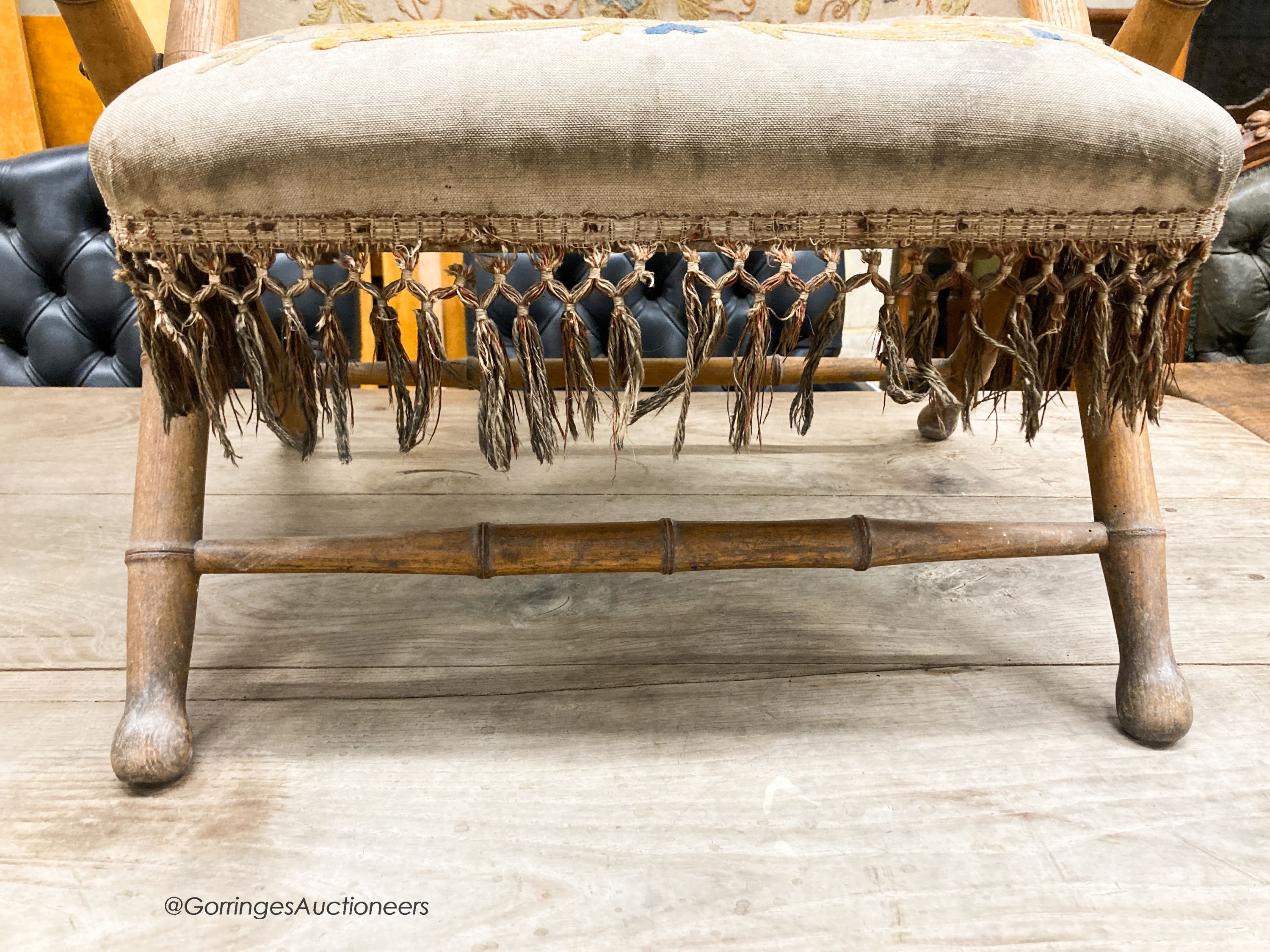 A Victorian faux bamboo folding chair with tapestry upholstery, W.66cm D.50cm H.90cm